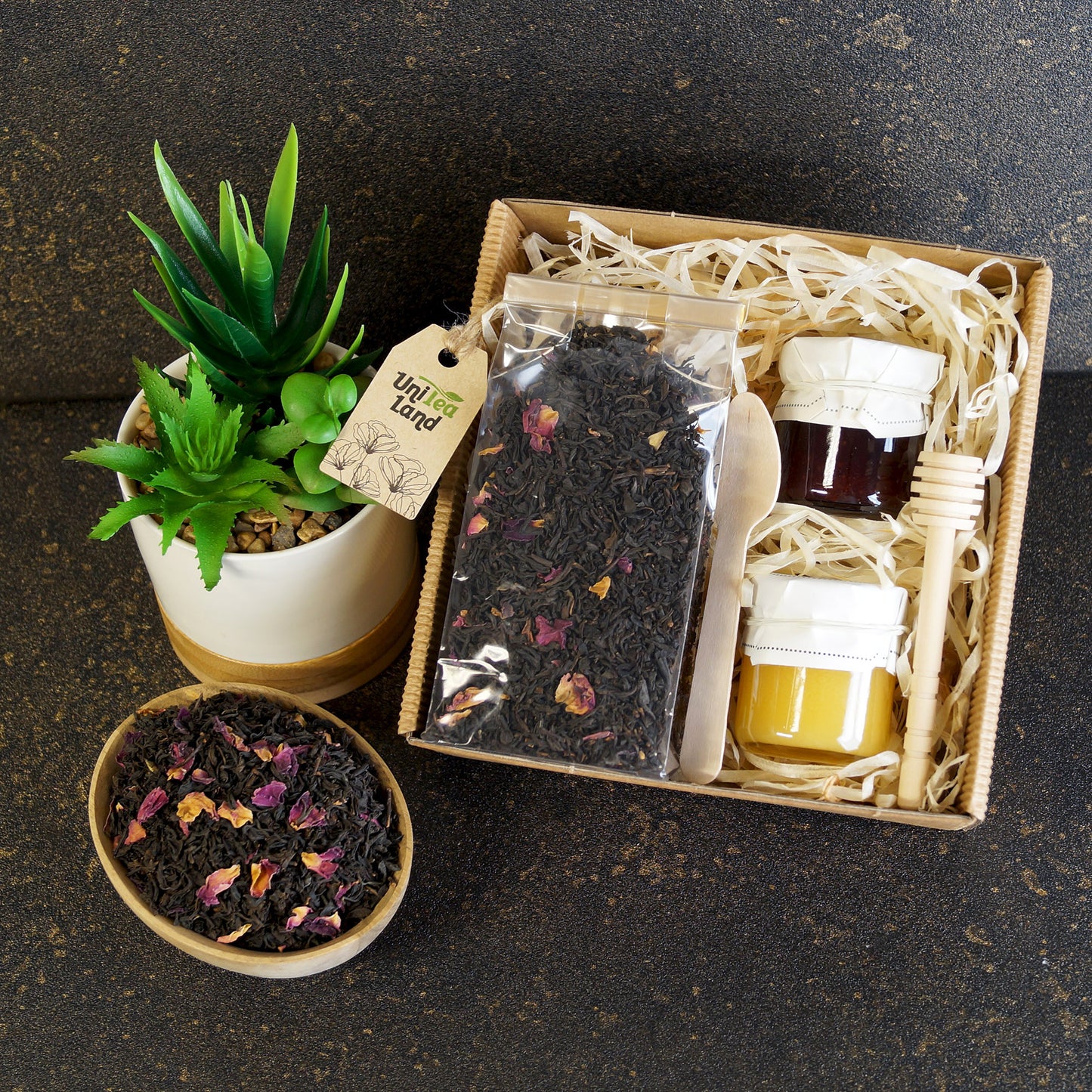 Birthday gift basket with tea and sweets inside
