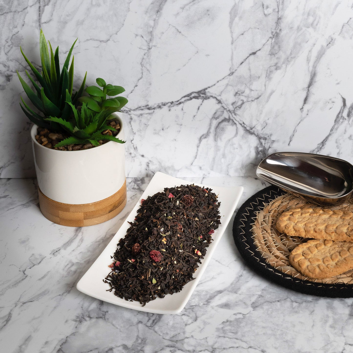 Black tea blend with raspberry, lavender flowers, and loose leaf tea leave