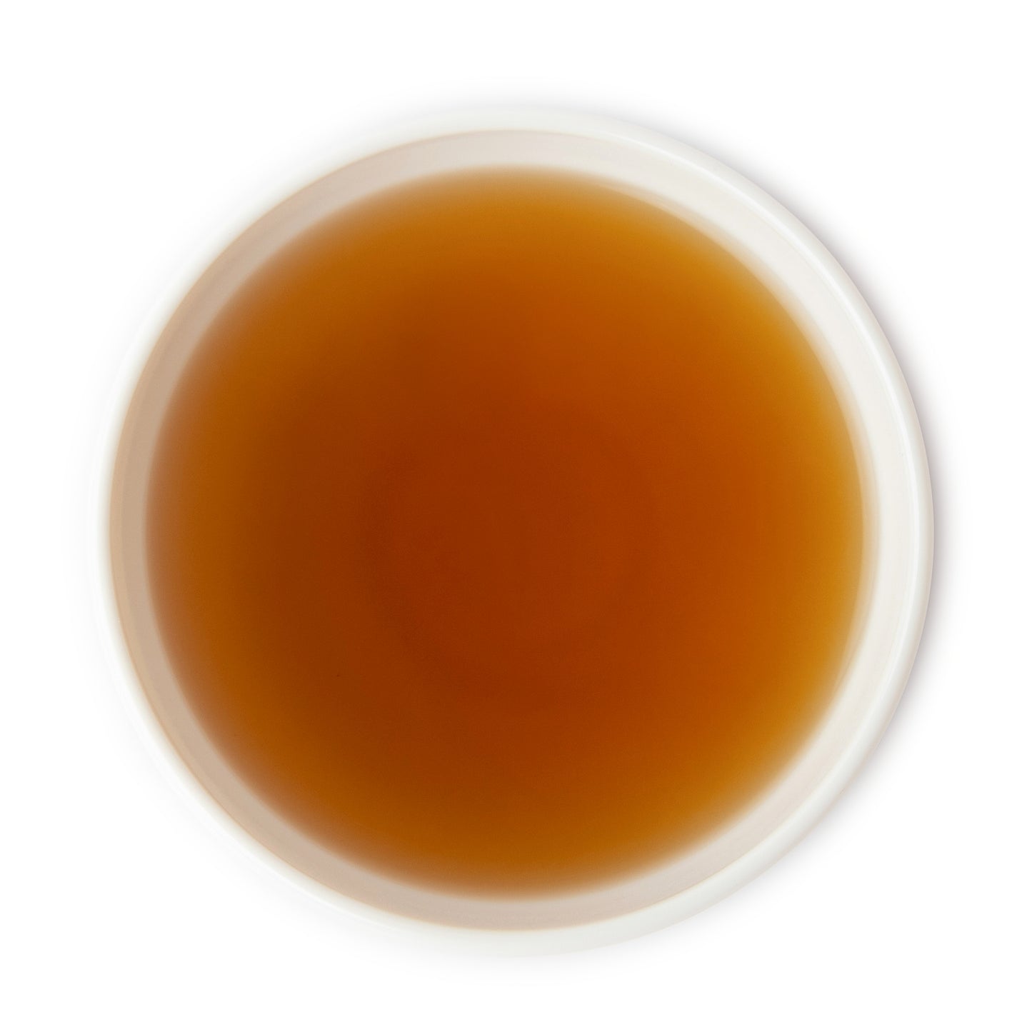 Cup of brewed China gunpowder black tea – rich and smoky flavor