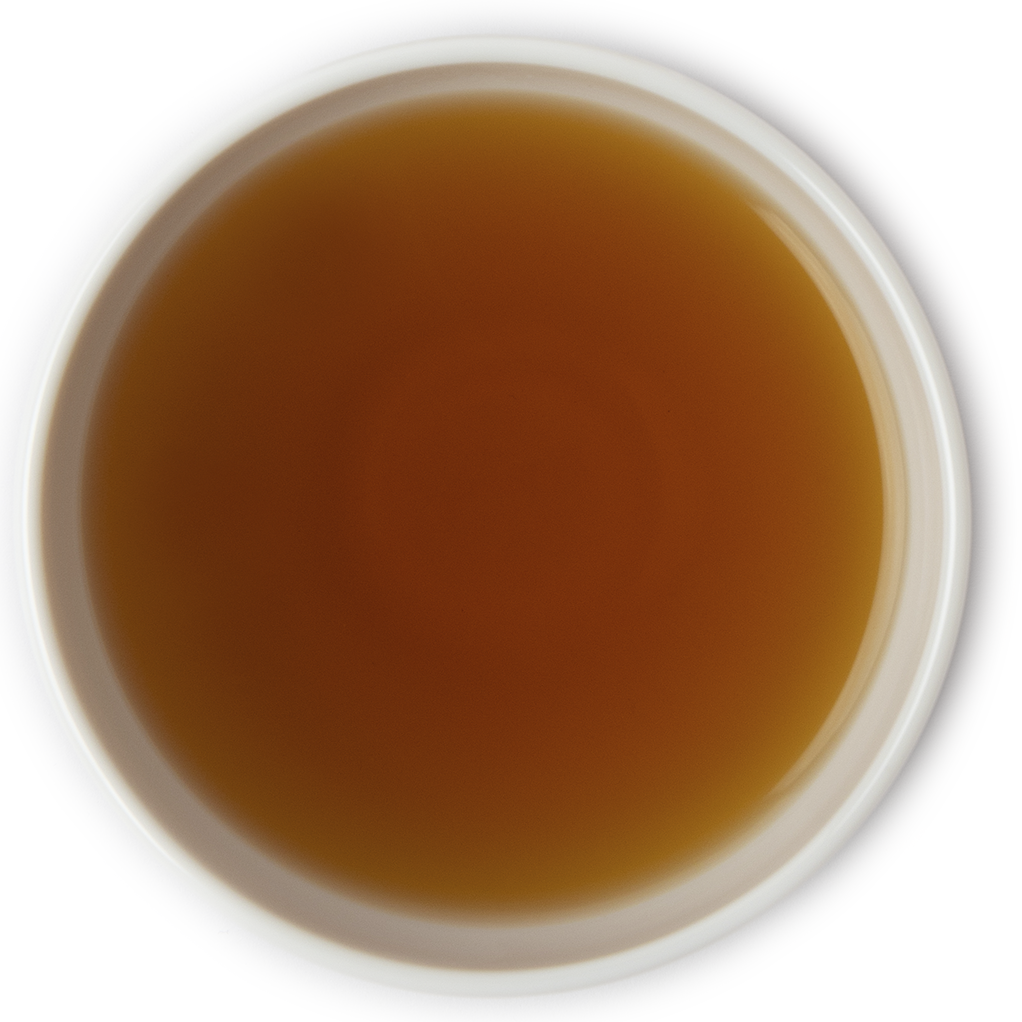 Brewed Evening Calm herbal tea with a soothing golden-red color and gentle aroma