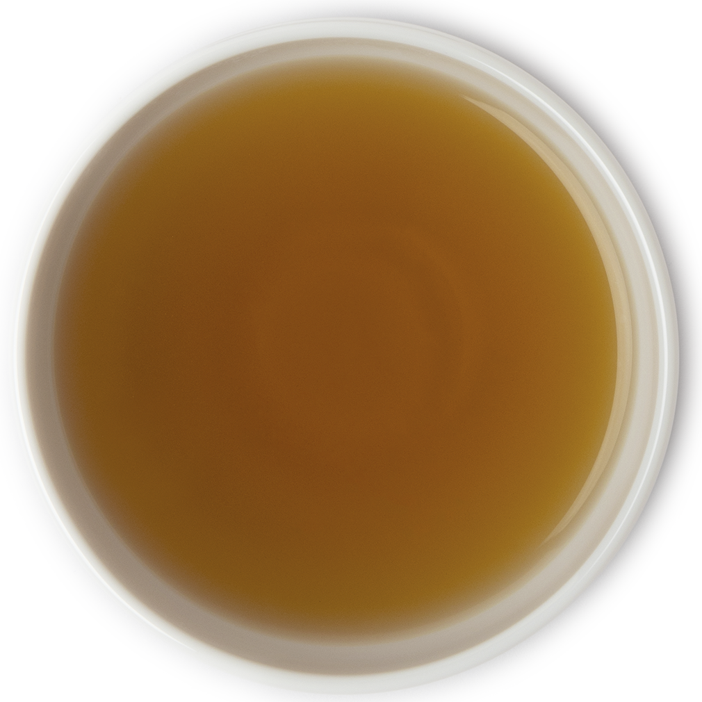 Brewed Morocco Mate herbal tea with a rich green color and refreshing citrusy aroma