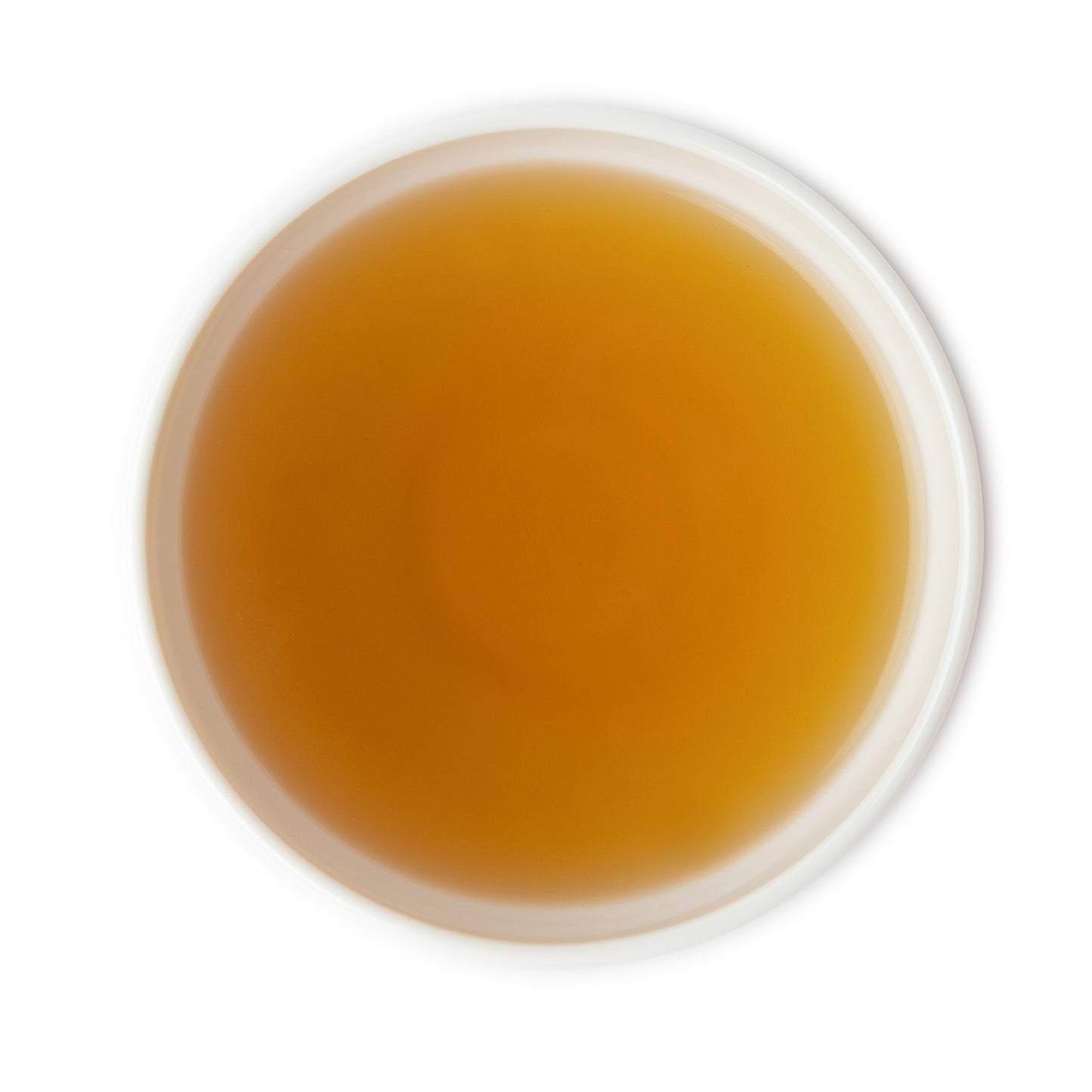 Brewed Mountain Blend herbal tea with light golden color and fresh minty citrus aroma