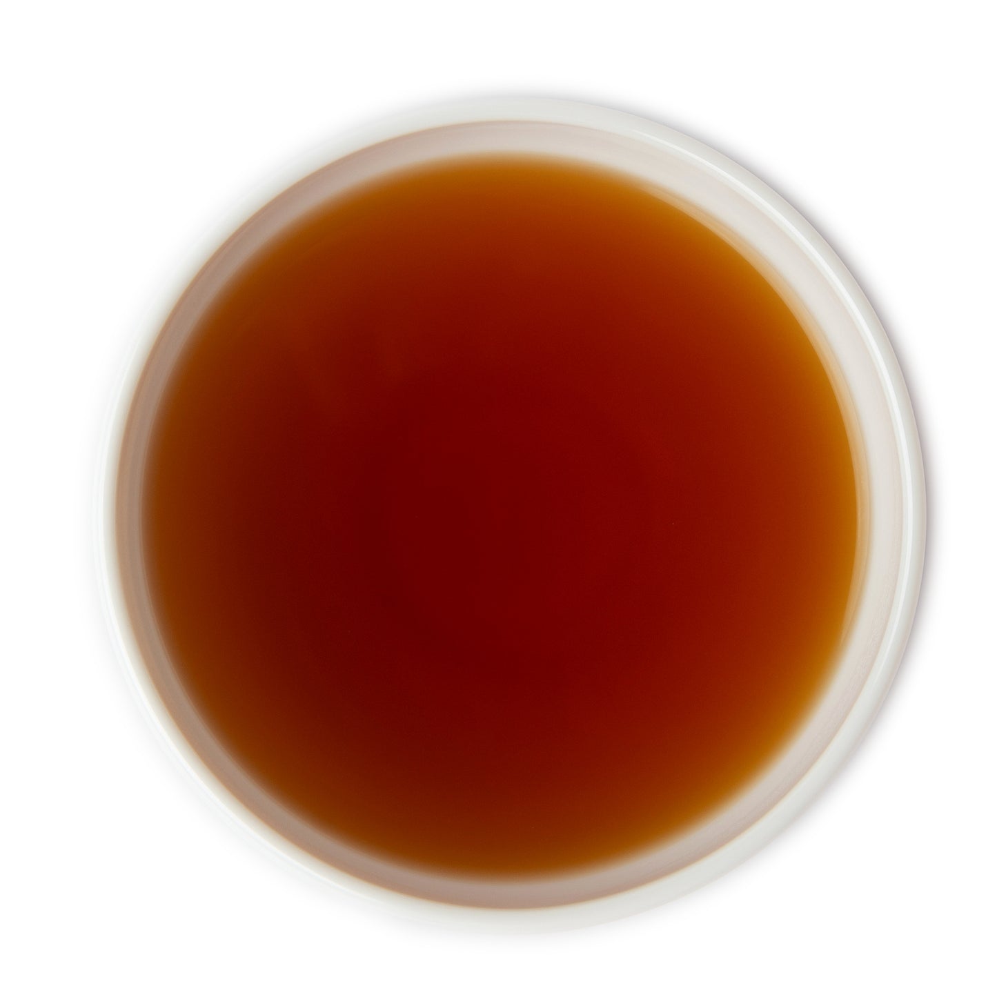 Brewed Rooibos Strawberry Tea — rich amber color with a sweet, fruity aroma perfect for relaxation