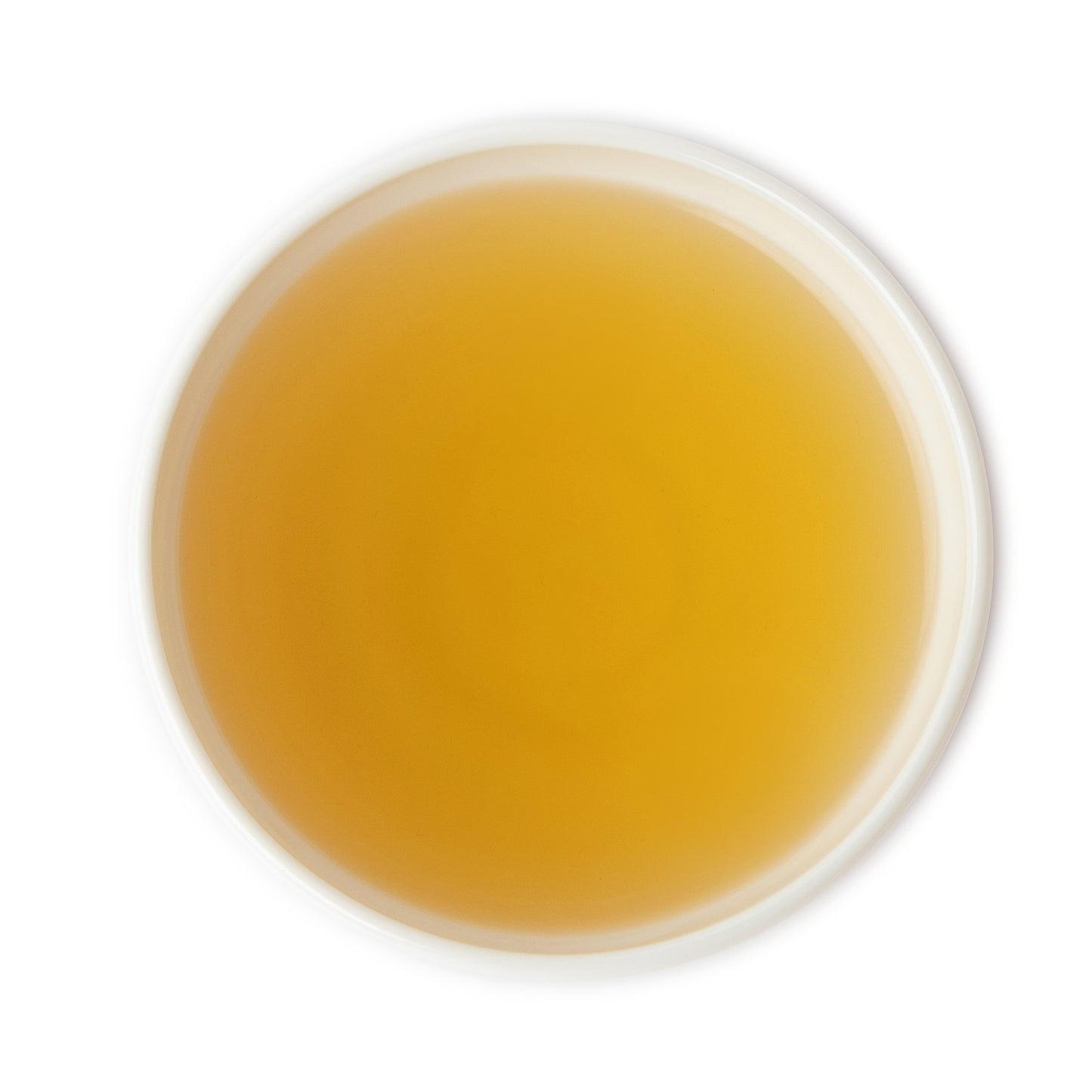 Brewed Yunnan green tea in a cup with a vibrant green color