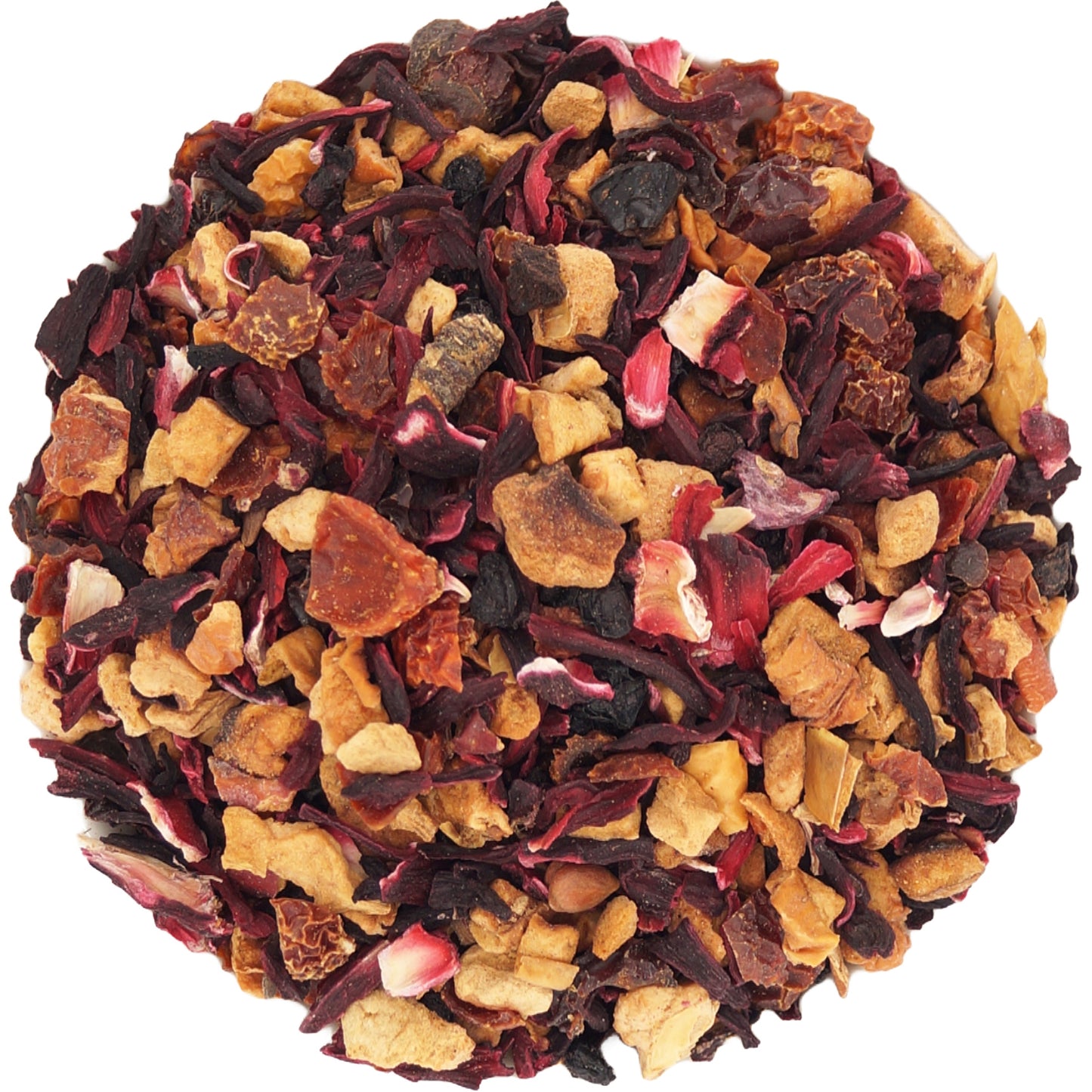 Close-up of child-friendly herbal tea ingredients: apple pieces, fruit bits, and flowers