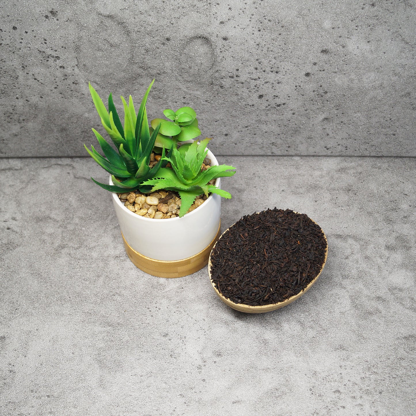 Organic Earl Grey loose leaf tea leaves in a wooden bowl