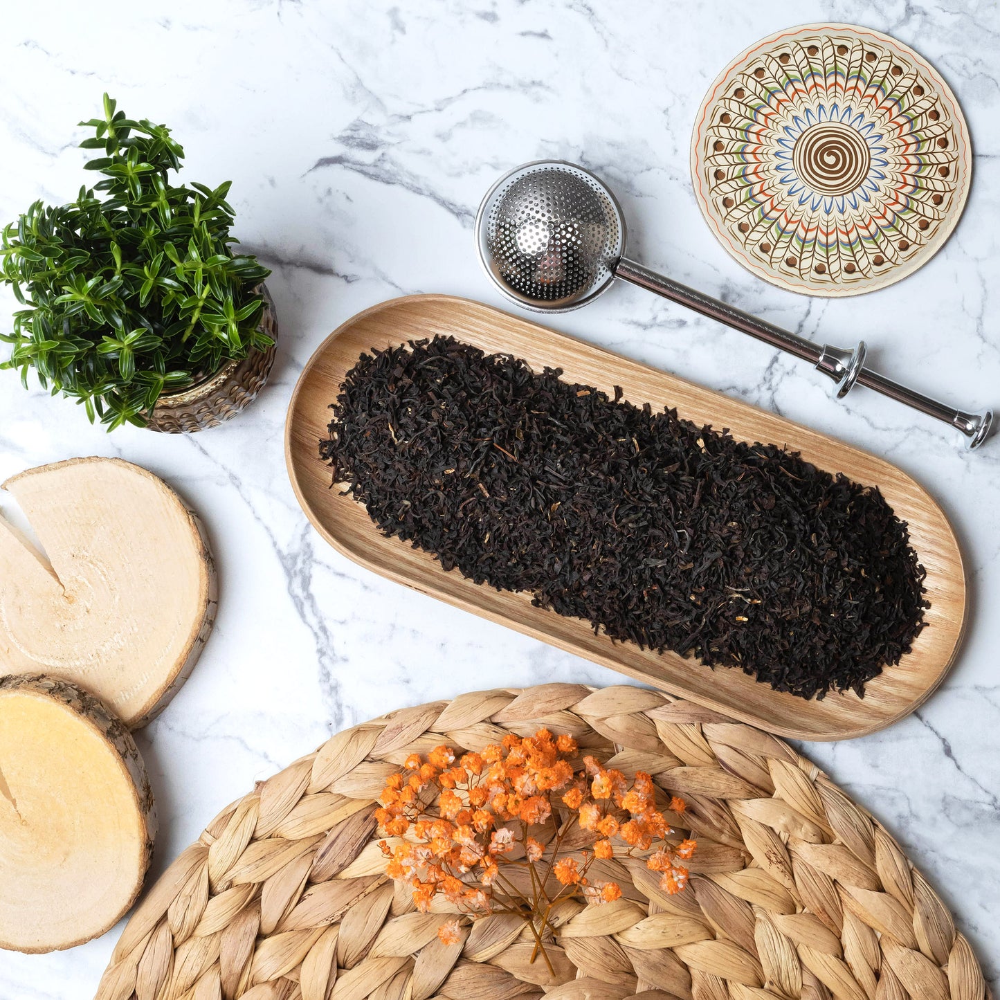 Kenya TGFOP tea leaves in wooden dish - tea from africa