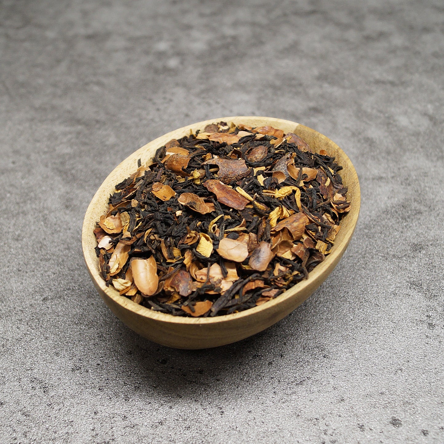 Loose leaf organic black tea with chocolate and cinnamon in a bowl