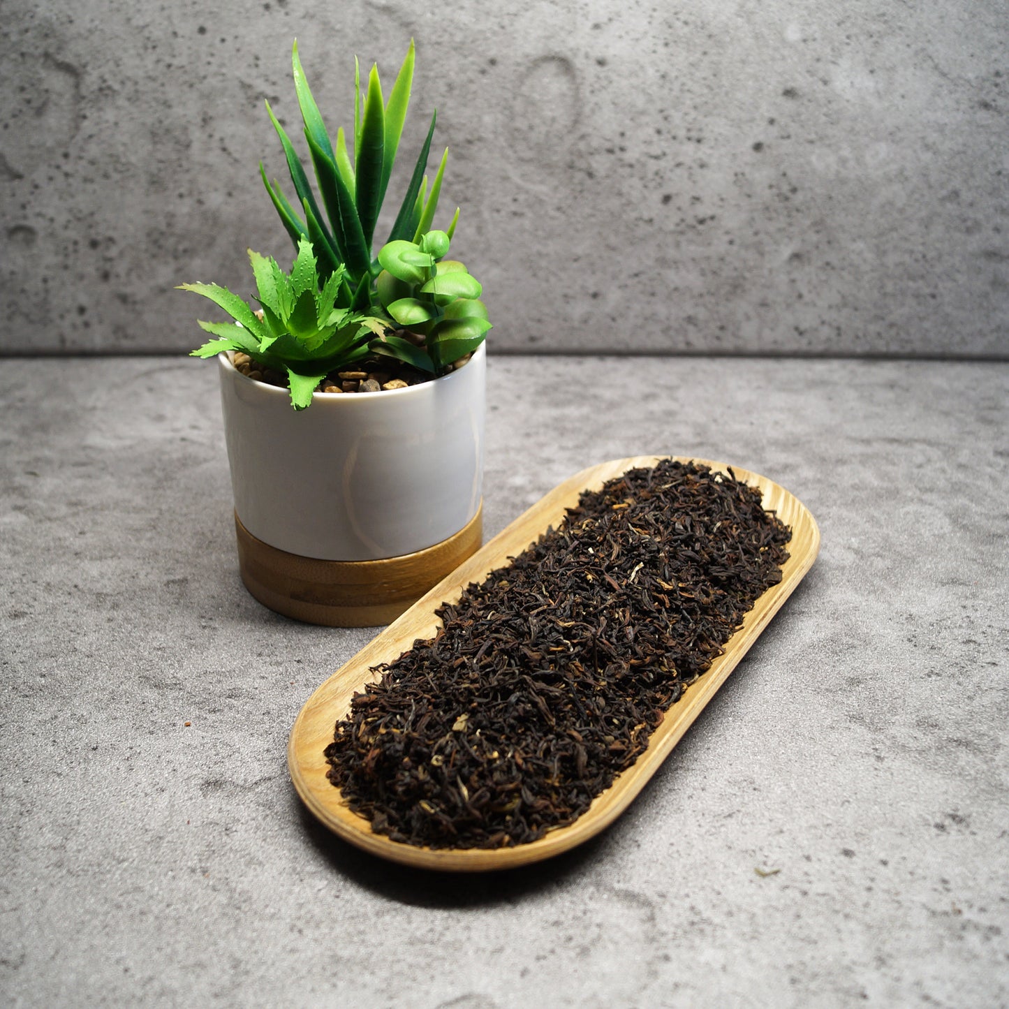 Loose leaf Organic Darjeeling Second Flush tea from Makaibari on wooden surface