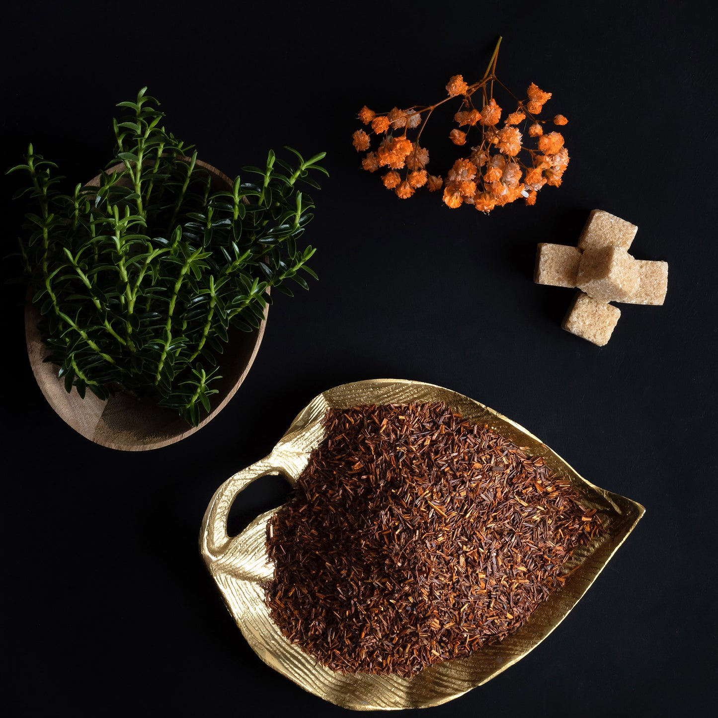 Organic loose leaf Rooibos tea blend — rich red-brown leaves, perfect for a calming, healthy cup