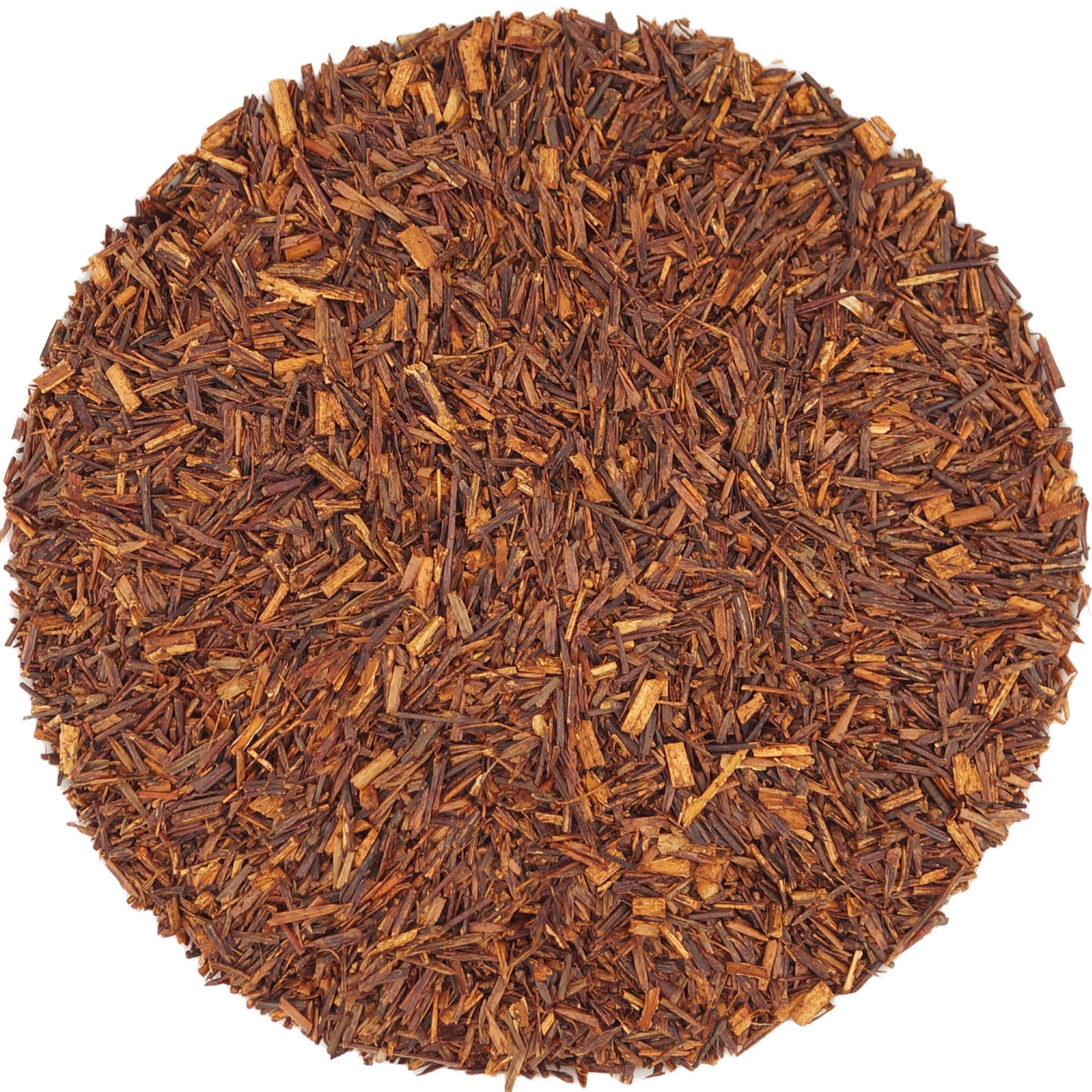 Close-up of organic loose leaf Rooibos tea — vibrant red-brown leaves with natural, earthy aroma