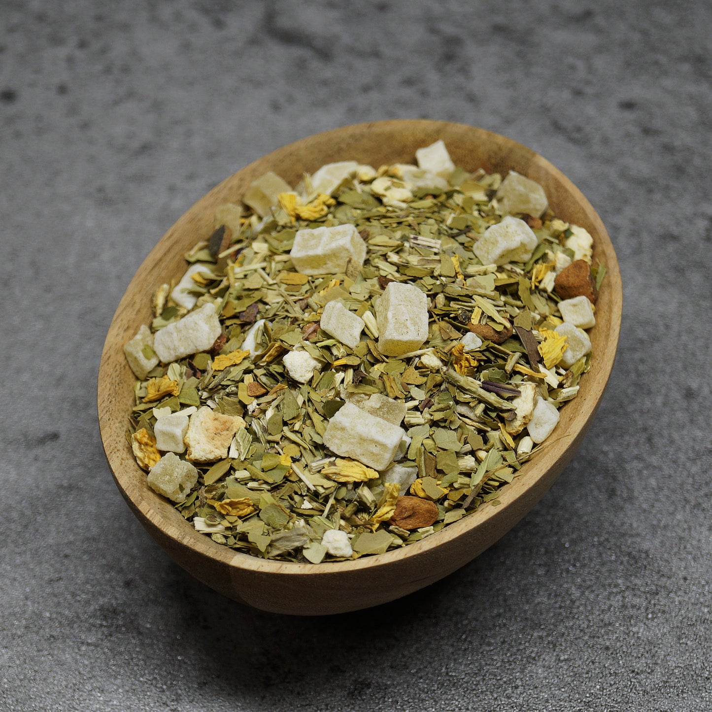 Ingredients of Sweet Exotic Mate tea – yerba mate, mango, citrus, and exotic fruits in a loose leaf herbal blend