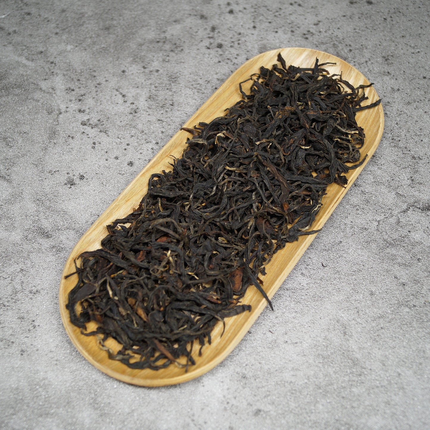 Tanzania Usambara Black Tea Leaves in Wooden Bowl - Loose Leaf Tea from Africa