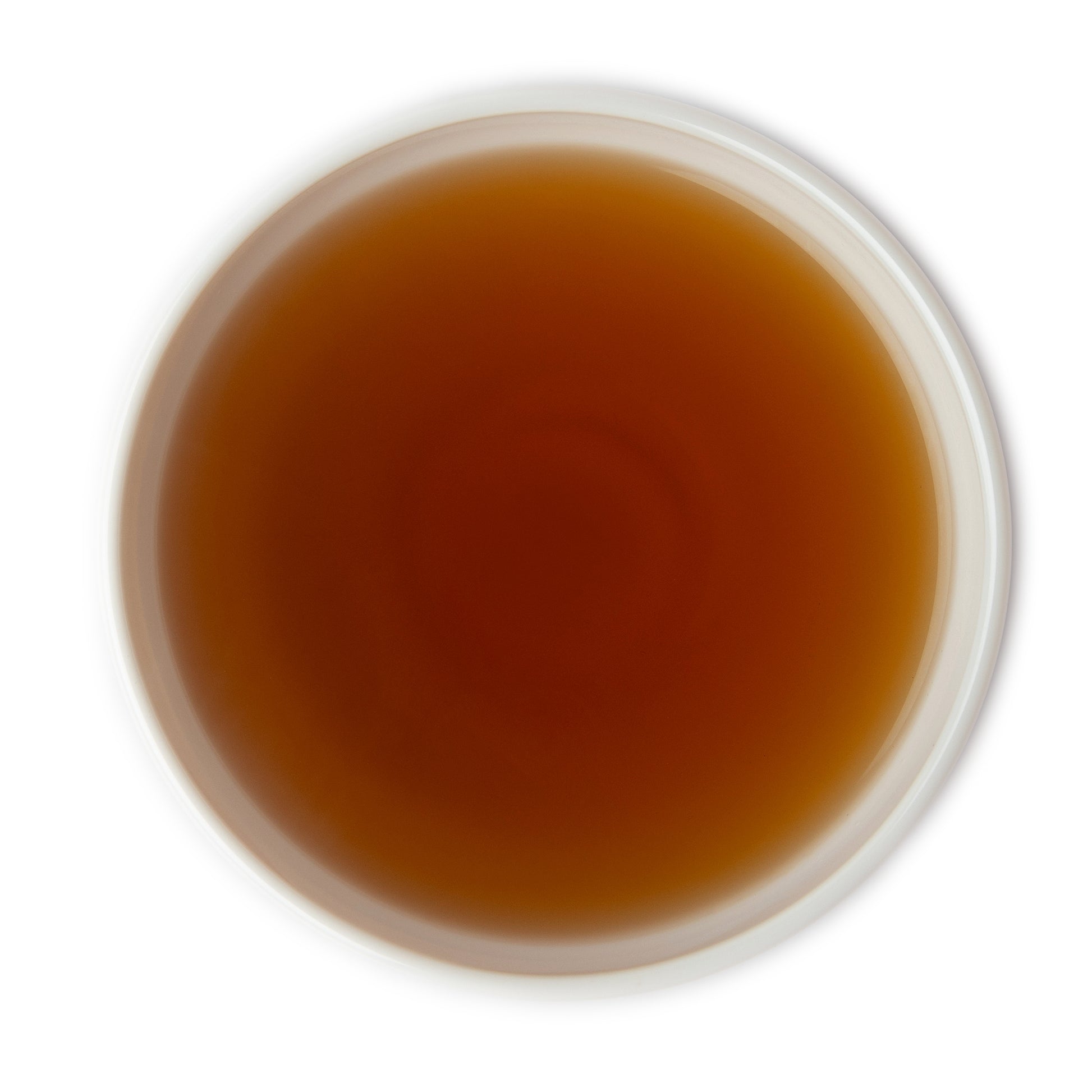 Brewed Darjeeling Second Flush black tea in cup – dark amber infusion