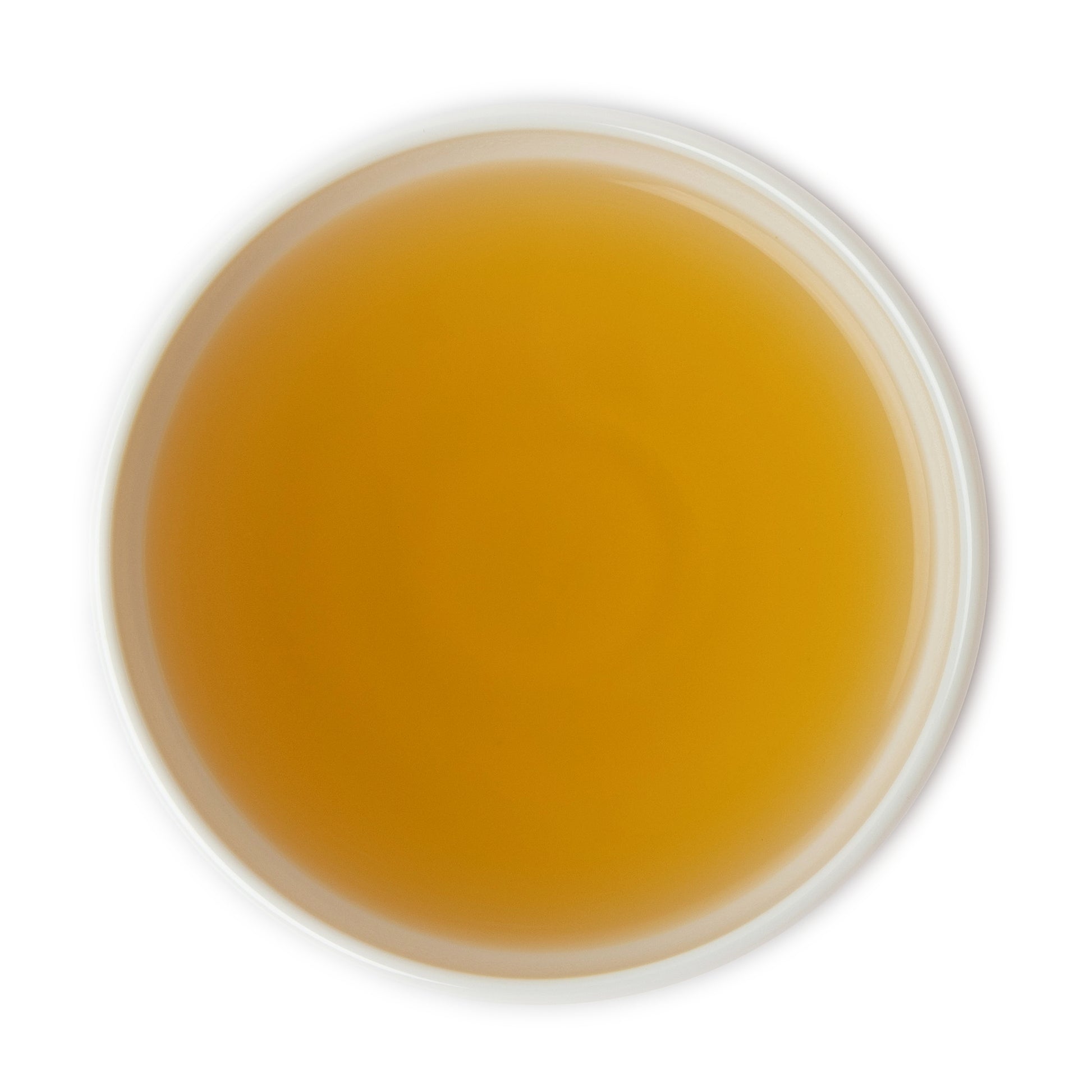 Brewed jasmine green tea in a cup, with a soothing floral aroma