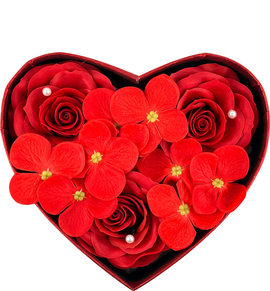 Gift box with red soap roses and heart-shaped arrangement for Valentine's Day