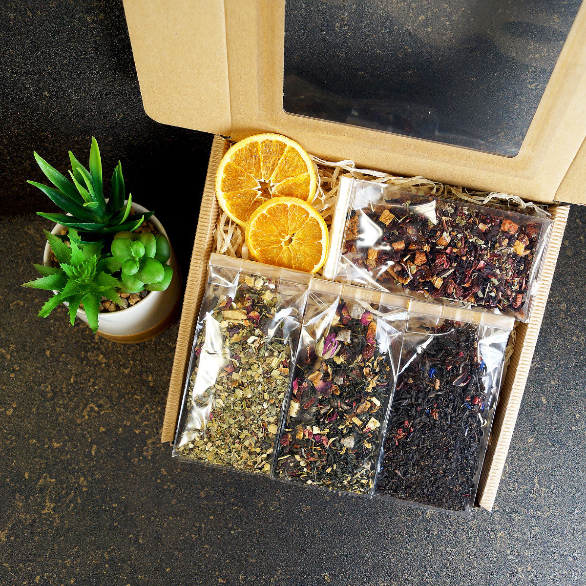Open Fruit Tea Gift Box Showing Colorful Assortment of Blends