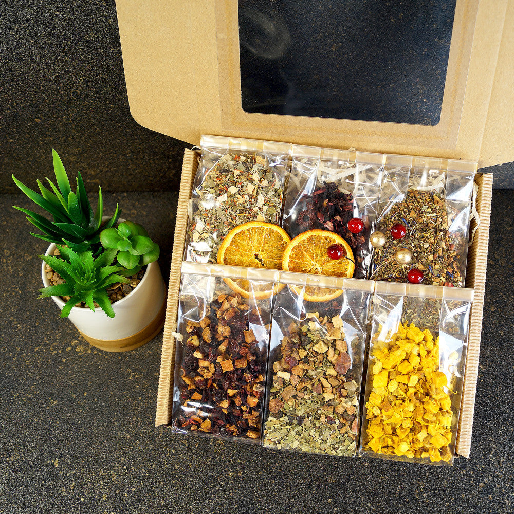 Open tea gift box showcasing a variety of premium loose leaf teas – Perfect gift set for tea lovers
