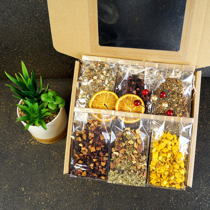Open tea gift box showcasing a variety of premium loose leaf teas – Perfect gift set for tea lovers