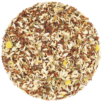 Close-up of chamomile, valerian, rooibos, and rosemary in a calming herbal tea blend