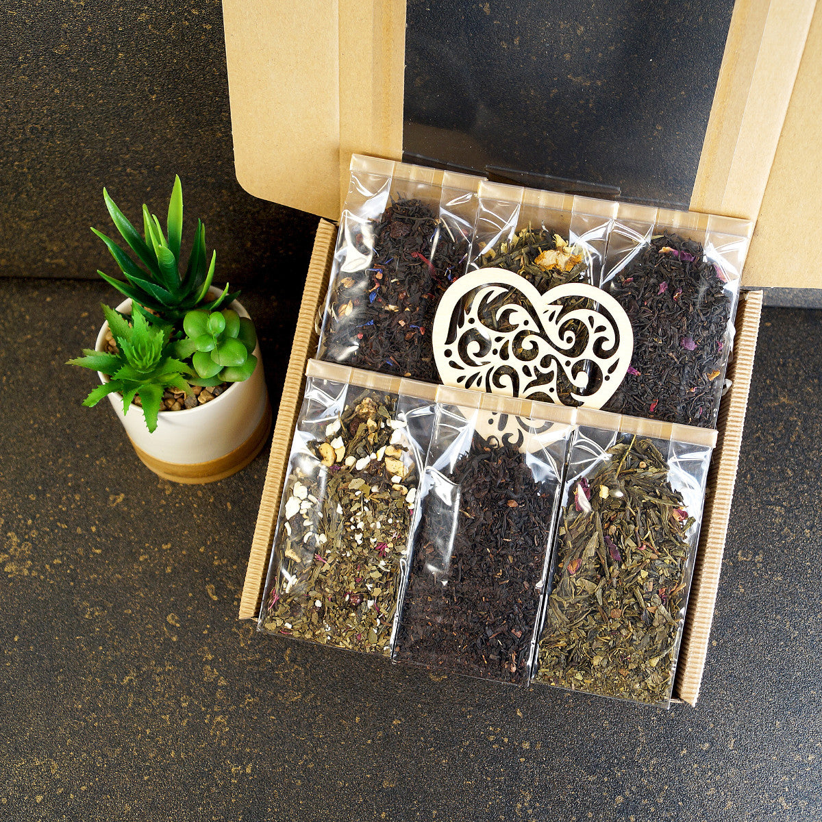 Tea gift box with assorted black and green teas, perfect gift for women