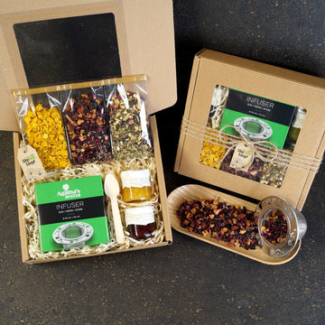 Luxury tea gift box with teapot and sweets inside