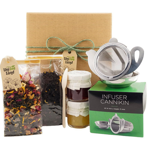 Premium tea gift set with teapot, sweets, and honey in gift box