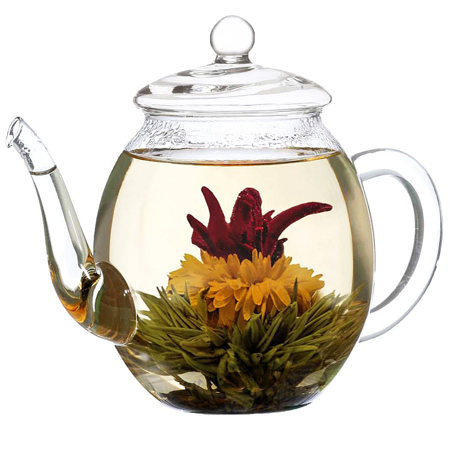 Organic blooming tea balls with vibrant flowers inside, providing a refreshing tea experience