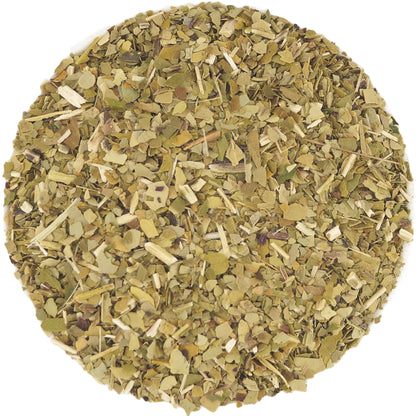 Close-up of yerba mate green tea leaves, showcasing their rich texture and vibrant green color